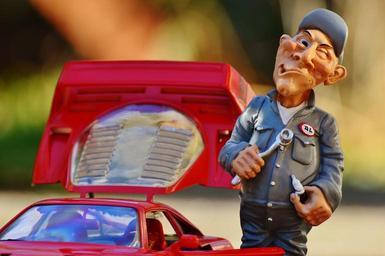 ferrari-racing-car-mechanic-repair-1111580.jpg