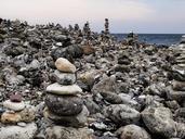 pebble-beach-sea-stones-pyramid-572359.jpg