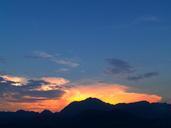 mountains-cloudy-blue-sky-sunsets-142298.jpg