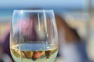 wine-glass-sun-beach-sand-657190.jpg