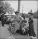 Hayward,_California._With_baggage_piled_on_sidewalk,_evacuees_of_Japanese_ancestry_await_evacuation_._._._-_NARA_-_537523.jpg