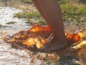 feet-splashing-water-mud-foot-fun-49187.jpg