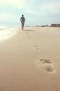 beach-woman-footprints-summer-731137.jpg