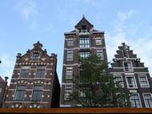 amsterdam-city-townhouses-buildings-385121.jpg