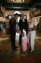 Military_Aide_Lieutenant_Colonel_David_Jones_and_David_Addington_Greet_a_Father_and_Daughter_in_Lobby_of_King_David_Hotel_in_Jerusalem.jpg