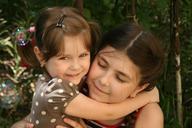 sisters-love-portrait-smile-hug-781098.jpg