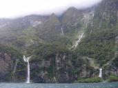 new-zealand-waterfall-mountains-179437.jpg