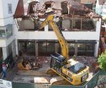 excavators-home-demolition-site-139974.jpg