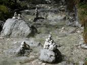 cairn-stones-riverbed-boulders-239612.jpg