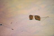 sunglasses-beach-sand-summer-768677.jpg