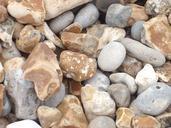 pebbles-beach-stone-coastline-906808.jpg