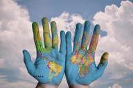 hands-world-map-global-earth-600497.jpg