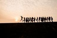 sunset-silhouette-party-youth-812158.jpg