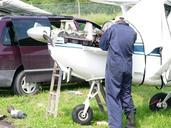 Field maintenance on a 1956 model Cessna 172.JPG