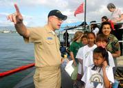 US_Navy_050214-N-5539C-001_Lt.j.g._Scott_Washburn_gives_a_tour_of_the_Los_Angeles-class_attack_submarine_USS_Louisville_(SSN_724)_to_25_Punahou_Elementary_School_third_graders_on_board_Naval_Station_Pearl_Harbor,_Hawaii.jpg