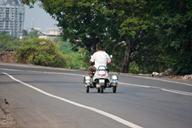 scooter-trike-india-road-traffic-390935.jpg