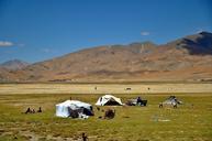 Mountain-and-grassland-on-Tibetan-Plateau-with-blue-sky.jpg