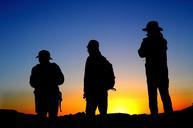 hikers-silhouettes-sunset-twilight-1249460.jpg