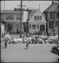 Oakland,_California._Baggage_of_evacuees_of_Japanese_ancestry_piled_on_the_sidewalk._The_Greyhound_._._._-_NARA_-_537701.jpg