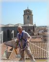 roof-repair-tiles-arles-france-man-141446.jpg