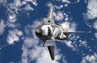 space-shuttle-discovery-above-iss-884659.jpg