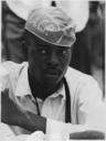 Civil_Rights_March_on_Washington,_D.C._(A_man_wearing_a_National_Association_for_the_Advancement_of_Colored_People_hat.)_-_NARA_-_542035.tif