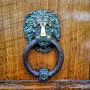 lion-knocker-door-bronze-patina-649886.jpg