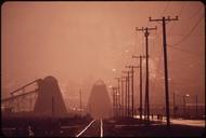 WOOD_CHIP_BURNERS_IN_SMOG_-_NARA_-_543007.tif