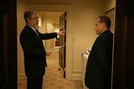 David_Addington_Talks_with_Jim_Nussle_in_West_Wing_Hallway.jpg