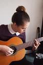 girl-guitar-strings-spanish-guitar-1089953.jpg