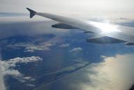 sea-bank-airplane-sky-reflection-249891.jpg