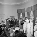 President_John_F._Kennedy_Signs_the_Equal_Pay_Act.jpg