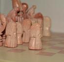 chess-pieces-stone-chess-game-close-613606.jpg