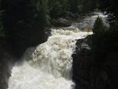 Waterfall with trees and rocks.jpg