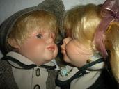 porcelain-dolls-kissing-close-up-78125.jpg