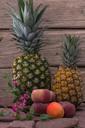 still-life-fruit-pineapple-flowers-836801.jpg