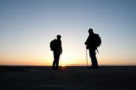 hikers-silhouettes-sunset-twilight-913273.jpg