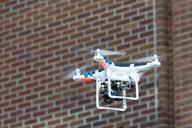 drone-brick-wall-flying-1350327.jpg