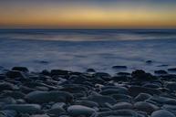 pebbles-sea-sunset-calm-stone-1031167.jpg