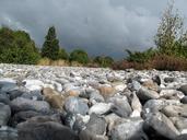 stones-pebble-riverbed-landscape-655292.jpg