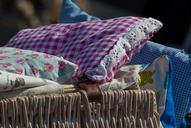 flea-market-pillows-bedding-basket-1678002.jpg