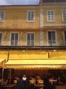 cafe-arles-yellow-building-windows-457634.jpg