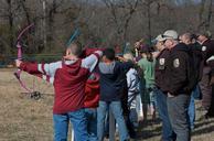 Group of teens practice their archery skills.jpg