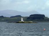 lighthouse-lonely-island-scotland-667367.jpg