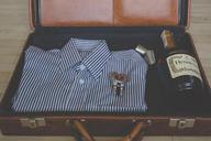 suitcase-shirt-wine-watch-luggage-918447.jpg