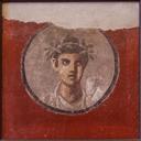 MANNapoli 120620 a Fresco young man with rolls from Pompeii Italy.jpg