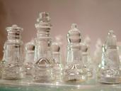 chess-pieces-glass-game-board-315360.jpg