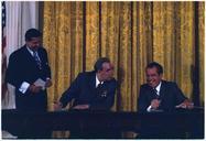 President_Nixon_and_General_Secretary_Brezhnev_signing_Scientific_and_Technical_Cooperation_Agreement_on_Peaceful..._-_NARA_-_194522.tif