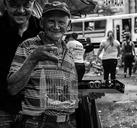 man-men-selling-parrots-birds-cage-114087.jpg