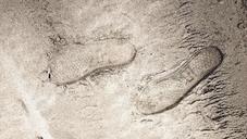 footprints-sand-beach-513009.jpg